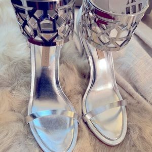 Silver size 8 BCBG Unique Sandals. Brand New never worn!